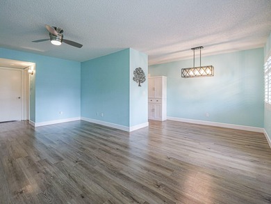 Spacious first floor condominium in vibrant 55+ community- on Vero Beach South Golf Course in Florida - for sale on GolfHomes.com, golf home, golf lot