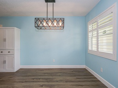 Spacious first floor condominium in vibrant 55+ community- on Vero Beach South Golf Course in Florida - for sale on GolfHomes.com, golf home, golf lot