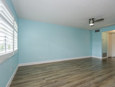 Spacious first floor condominium  in vibrant 55+ community- on Vero Beach South Golf Course in Florida - for sale on GolfHomes.com, golf home, golf lot