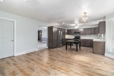 Beautiful two-story home in the coveted Lake Doster Community on Lake Doster Golf Club in Michigan - for sale on GolfHomes.com, golf home, golf lot