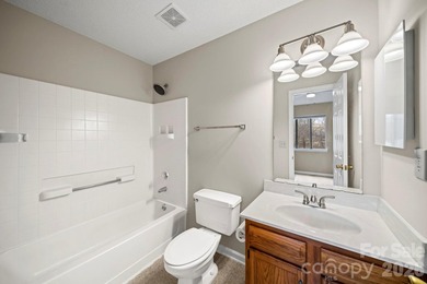 Discover low-maintenance living within the highly desirable on Raintree Country Club in North Carolina - for sale on GolfHomes.com, golf home, golf lot