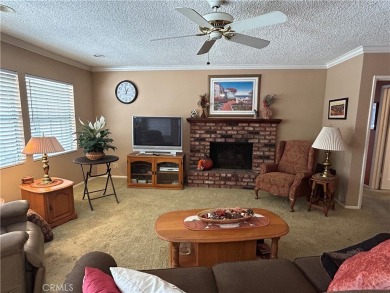 This single-story home situated in South of Conant neighborhood on Skylinks At Long Beach Golf Course in California - for sale on GolfHomes.com, golf home, golf lot