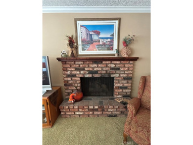 This single-story home situated in South of Conant neighborhood on Skylinks At Long Beach Golf Course in California - for sale on GolfHomes.com, golf home, golf lot