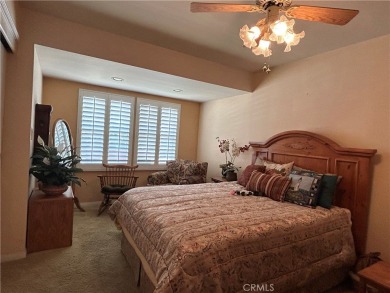 This single-story home situated in South of Conant neighborhood on Skylinks At Long Beach Golf Course in California - for sale on GolfHomes.com, golf home, golf lot