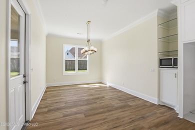 Stunning new construction in the best location possible: Lake on Lake Caroline Golf Club in Mississippi - for sale on GolfHomes.com, golf home, golf lot