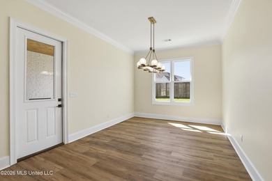 Stunning new construction in the best location possible: Lake on Lake Caroline Golf Club in Mississippi - for sale on GolfHomes.com, golf home, golf lot