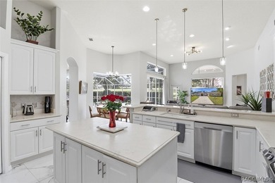 Nestled beneath a canopy of mature oaks on a lush, expansive lot on Citrus Hills Golf Club in Florida - for sale on GolfHomes.com, golf home, golf lot