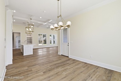 Stunning new construction in the best location possible: Lake on Lake Caroline Golf Club in Mississippi - for sale on GolfHomes.com, golf home, golf lot