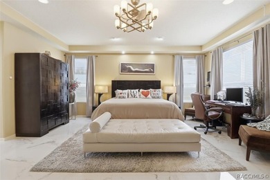 Nestled beneath a canopy of mature oaks on a lush, expansive lot on Citrus Hills Golf Club in Florida - for sale on GolfHomes.com, golf home, golf lot