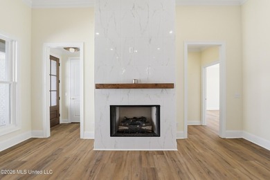 Stunning new construction in the best location possible: Lake on Lake Caroline Golf Club in Mississippi - for sale on GolfHomes.com, golf home, golf lot