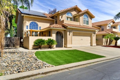 This stunning two-story home boasts a seamless blend of modern on Lemoore Municipal Golf Course in California - for sale on GolfHomes.com, golf home, golf lot