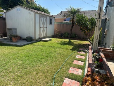This single-story home situated in South of Conant neighborhood on Skylinks At Long Beach Golf Course in California - for sale on GolfHomes.com, golf home, golf lot
