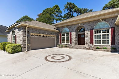 Magnificent all-brick custom home, located on a cul-de-sac on Sea Trail Golf Resort in North Carolina - for sale on GolfHomes.com, golf home, golf lot