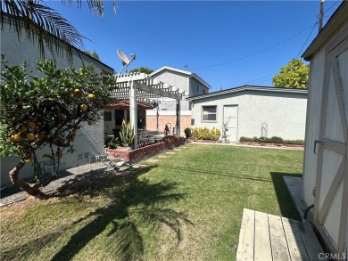 This single-story home situated in South of Conant neighborhood on Skylinks At Long Beach Golf Course in California - for sale on GolfHomes.com, golf home, golf lot