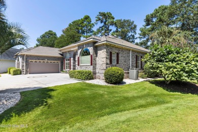 Magnificent all-brick custom home, located on a cul-de-sac on Sea Trail Golf Resort in North Carolina - for sale on GolfHomes.com, golf home, golf lot
