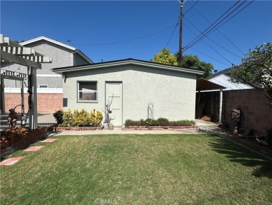 This single-story home situated in South of Conant neighborhood on Skylinks At Long Beach Golf Course in California - for sale on GolfHomes.com, golf home, golf lot