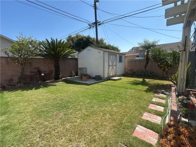 This single-story home situated in South of Conant neighborhood on Skylinks At Long Beach Golf Course in California - for sale on GolfHomes.com, golf home, golf lot
