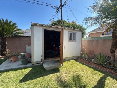 This single-story home situated in South of Conant neighborhood on Skylinks At Long Beach Golf Course in California - for sale on GolfHomes.com, golf home, golf lot