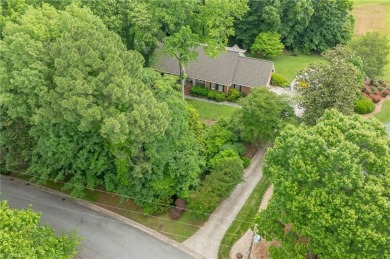 This Stately beauty is more than just home--it's a retreat. 4 on Greensboro Country Club - Carlson Farm Course in North Carolina - for sale on GolfHomes.com, golf home, golf lot