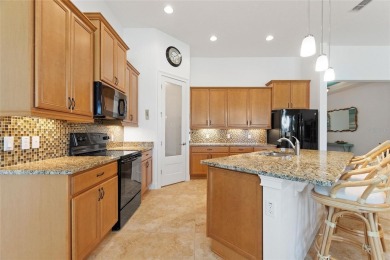 Welcome to 346 Treviso, where subtle elegance meets easy on Stonegate Golf Club in Florida - for sale on GolfHomes.com, golf home, golf lot