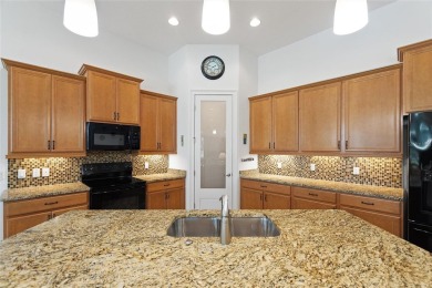 Welcome to 346 Treviso, where subtle elegance meets easy on Stonegate Golf Club in Florida - for sale on GolfHomes.com, golf home, golf lot