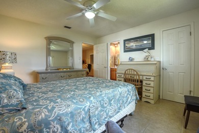 Welcome home to this well-maintained 2-bedroom, 2 bath CBS home on Leisureville Community Golf Course in Florida - for sale on GolfHomes.com, golf home, golf lot