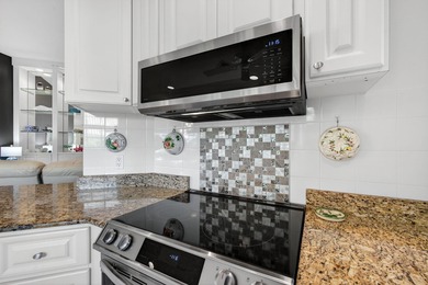 Pristine and beautifully updated, this 2-bed, 2-bath Capri model on The Florida Club in Florida - for sale on GolfHomes.com, golf home, golf lot