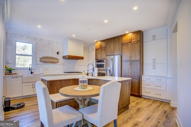 Assumable 5.25% financing on one of the most iconic modern on Turtle Cove Golf Course in Georgia - for sale on GolfHomes.com, golf home, golf lot