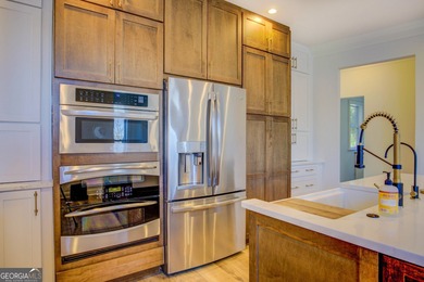 Assumable 5.25% financing on one of the most iconic modern on Turtle Cove Golf Course in Georgia - for sale on GolfHomes.com, golf home, golf lot