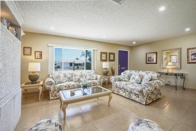 Welcome home to this well-maintained 2-bedroom, 2 bath CBS home on Leisureville Community Golf Course in Florida - for sale on GolfHomes.com, golf home, golf lot