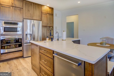 Assumable 5.25% financing on one of the most iconic modern on Turtle Cove Golf Course in Georgia - for sale on GolfHomes.com, golf home, golf lot