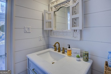 Assumable 5.25% financing on one of the most iconic modern on Turtle Cove Golf Course in Georgia - for sale on GolfHomes.com, golf home, golf lot