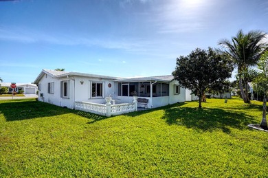 Welcome home to this well-maintained 2-bedroom, 2 bath CBS home on Leisureville Community Golf Course in Florida - for sale on GolfHomes.com, golf home, golf lot