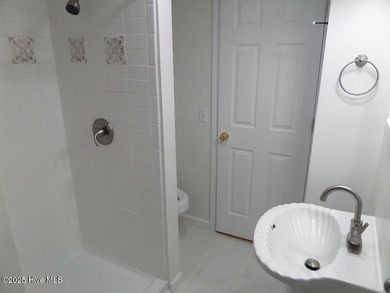 Charming Starter Home or Cozy Getaway! Welcome to this on Minnesott Golf and Country Club in North Carolina - for sale on GolfHomes.com, golf home, golf lot