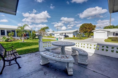 Welcome home to this well-maintained 2-bedroom, 2 bath CBS home on Leisureville Community Golf Course in Florida - for sale on GolfHomes.com, golf home, golf lot