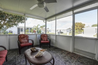 Welcome home to this well-maintained 2-bedroom, 2 bath CBS home on Leisureville Community Golf Course in Florida - for sale on GolfHomes.com, golf home, golf lot