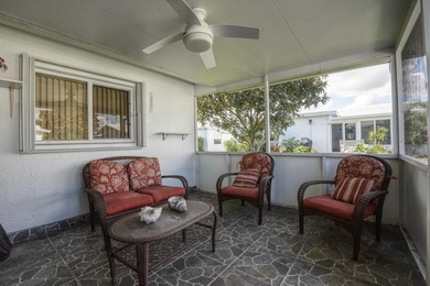 Welcome home to this well-maintained 2-bedroom, 2 bath CBS home on Leisureville Community Golf Course in Florida - for sale on GolfHomes.com, golf home, golf lot