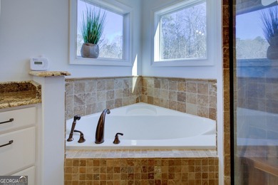 Assumable 5.25% financing on one of the most iconic modern on Turtle Cove Golf Course in Georgia - for sale on GolfHomes.com, golf home, golf lot