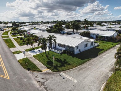 Welcome home to this well-maintained 2-bedroom, 2 bath CBS home on Leisureville Community Golf Course in Florida - for sale on GolfHomes.com, golf home, golf lot