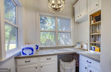 Assumable 5.25% financing on one of the most iconic modern on Turtle Cove Golf Course in Georgia - for sale on GolfHomes.com, golf home, golf lot