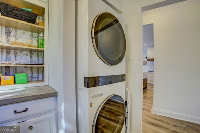 Assumable 5.25% financing on one of the most iconic modern on Turtle Cove Golf Course in Georgia - for sale on GolfHomes.com, golf home, golf lot