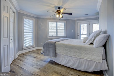 Assumable 5.25% financing on one of the most iconic modern on Turtle Cove Golf Course in Georgia - for sale on GolfHomes.com, golf home, golf lot