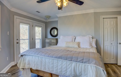 Assumable 5.25% financing on one of the most iconic modern on Turtle Cove Golf Course in Georgia - for sale on GolfHomes.com, golf home, golf lot