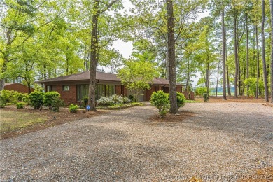 Behind the gates of Woodlake on nearly 1 acre, this on Woodlake Country Club in North Carolina - for sale on GolfHomes.com, golf home, golf lot