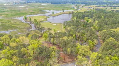 Behind the gates of Woodlake on nearly 1 acre, this on Woodlake Country Club in North Carolina - for sale on GolfHomes.com, golf home, golf lot