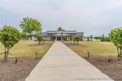 Behind the gates of Woodlake on nearly 1 acre, this on Woodlake Country Club in North Carolina - for sale on GolfHomes.com, golf home, golf lot