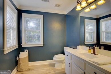 Assumable 5.25% financing on one of the most iconic modern on Turtle Cove Golf Course in Georgia - for sale on GolfHomes.com, golf home, golf lot