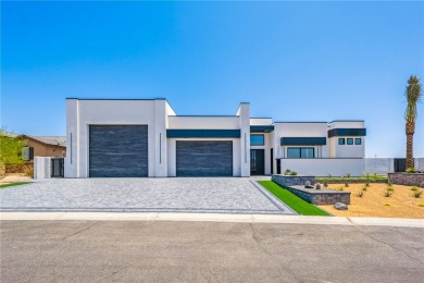 Located at 2446 E La Mancha in the prestigious gated community on Los Lagos Golf Club in Arizona - for sale on GolfHomes.com, golf home, golf lot