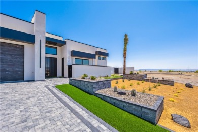 Located at 2446 E La Mancha in the prestigious gated community on Los Lagos Golf Club in Arizona - for sale on GolfHomes.com, golf home, golf lot
