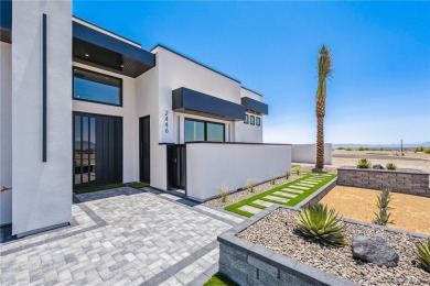 Located at 2446 E La Mancha in the prestigious gated community on Los Lagos Golf Club in Arizona - for sale on GolfHomes.com, golf home, golf lot